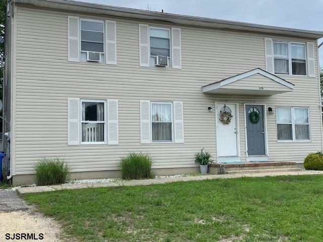 772 Jane Drive Manahawkin, NJ 08050 - Photo 2 of 18 a front view of a house with a yard