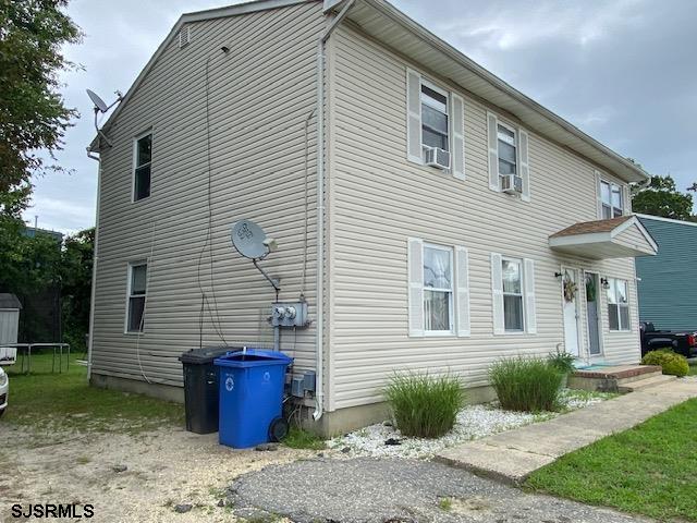 772 Jane Drive Manahawkin, NJ 08050 - Photo 3 of 18 a front view of a house with garden