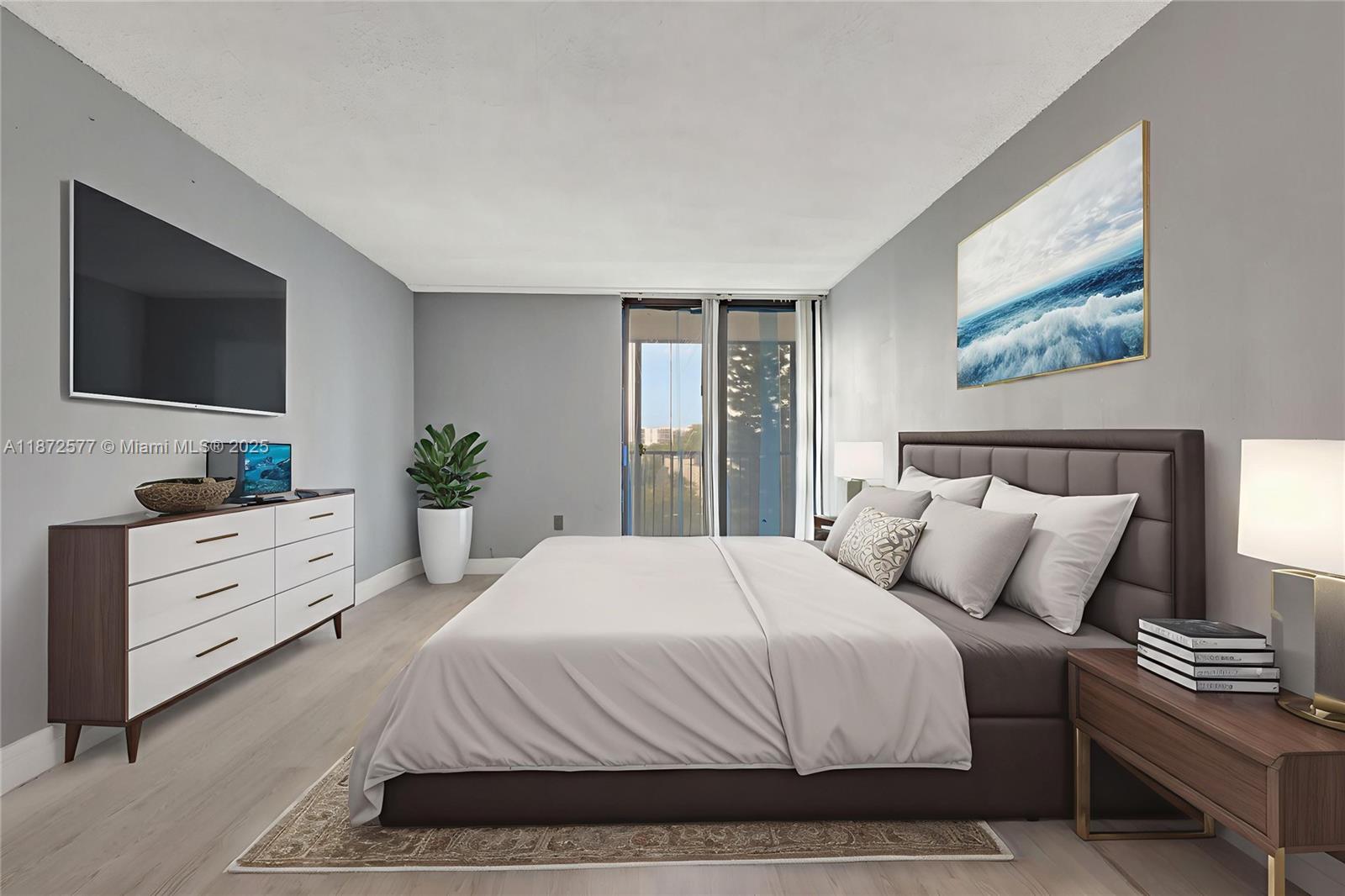 20100 West Country Club Drive, Unit 403 Aventura, FL 33180 - Photo 14 of 24 a bedroom with a large bed and a flat screen tv