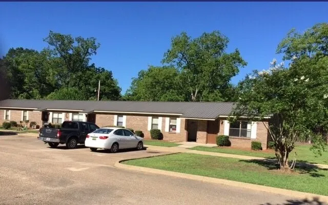 a car parked in front of a house