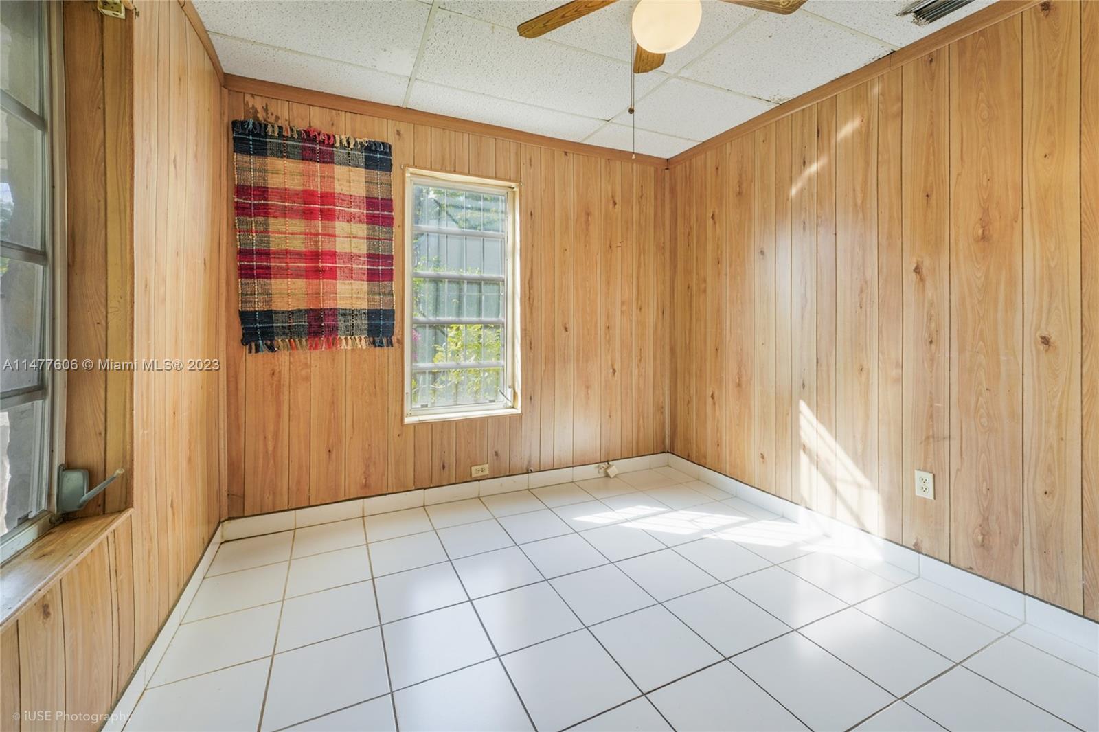 1037 Southwest 10th Avenue Miami, FL 33130 - Photo 11 of 19 a view of an empty room with a window