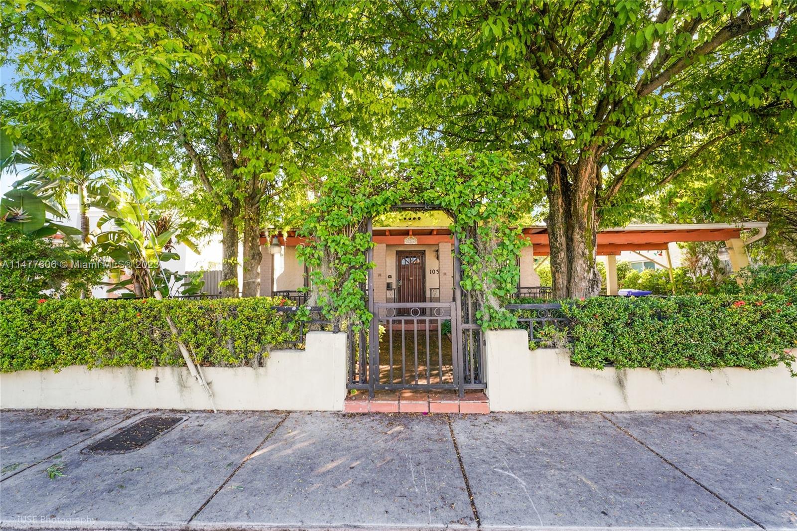 1037 Southwest 10th Avenue Miami, FL 33130 - Photo 3 of 19 a view of a house with a tree and plants