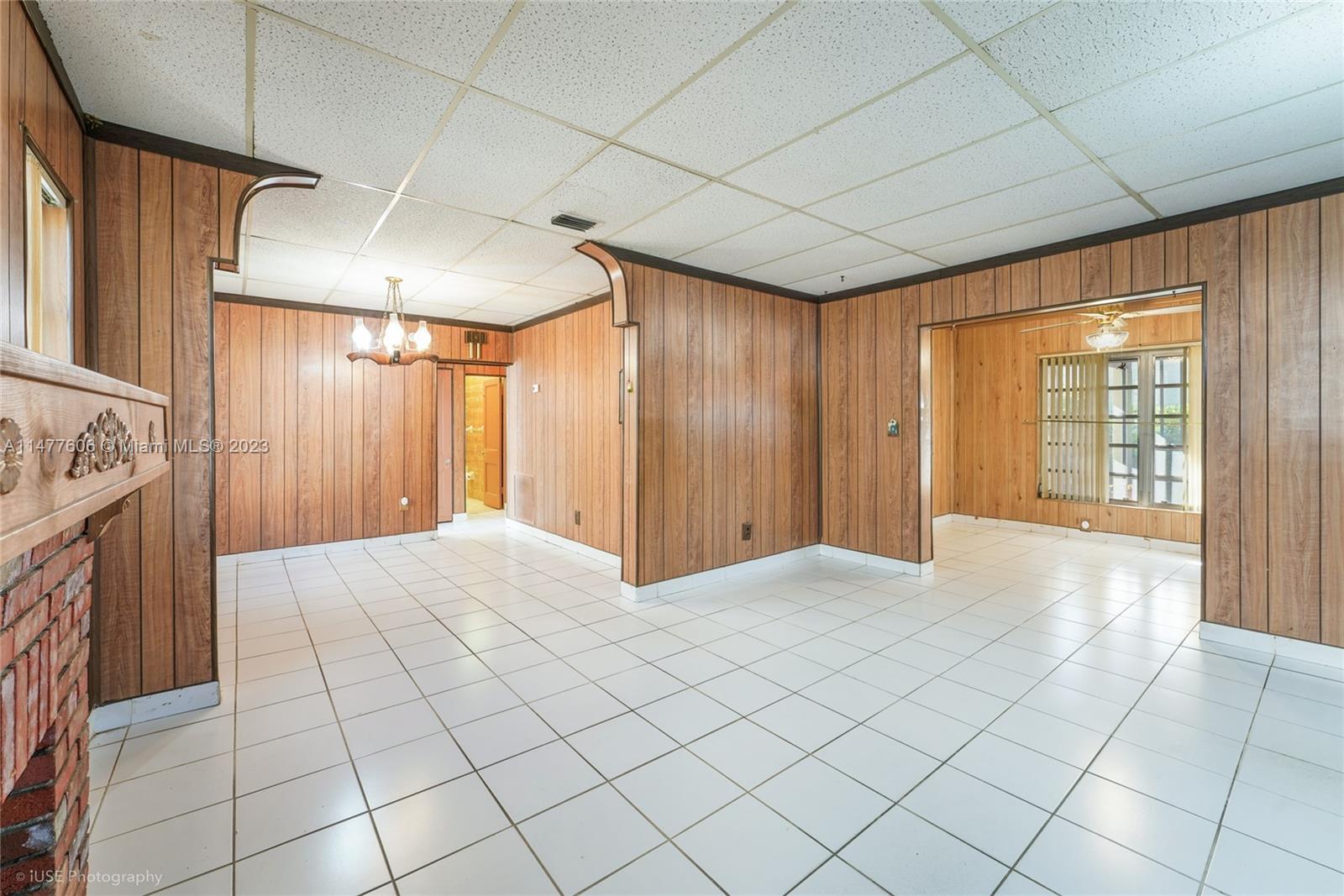 1037 Southwest 10th Avenue Miami, FL 33130 - Photo 4 of 19 a view of an empty room with a fireplace