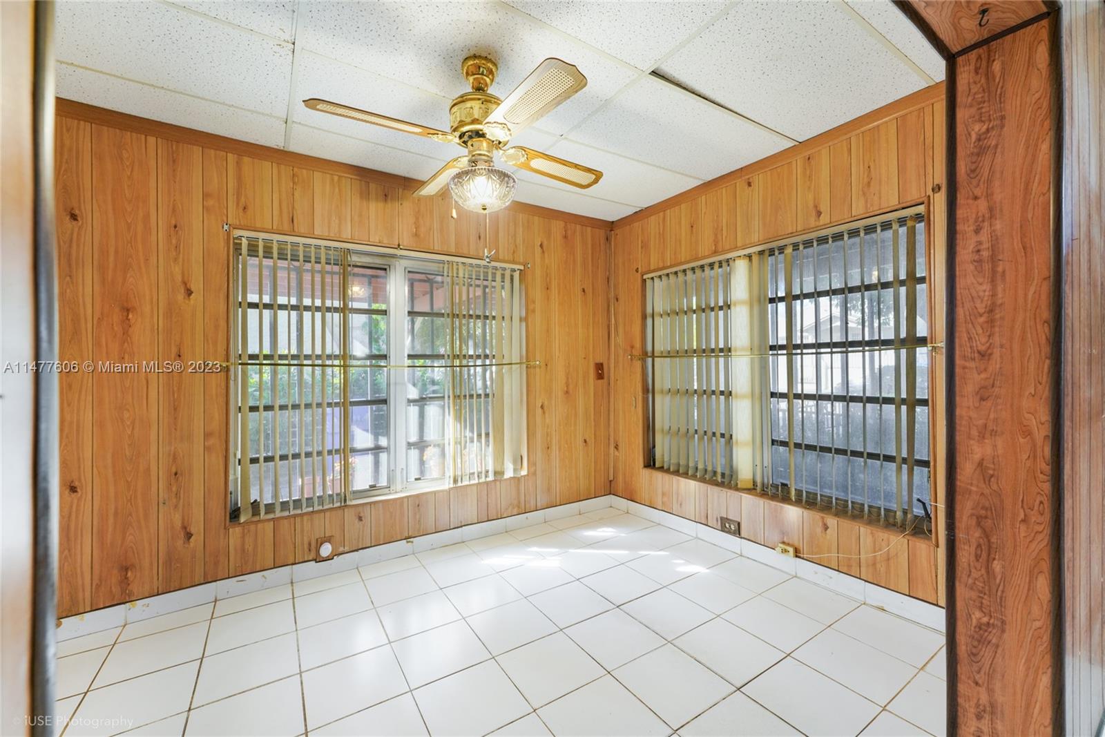 1037 Southwest 10th Avenue Miami, FL 33130 - Photo 5 of 19 a view of an empty room with a window