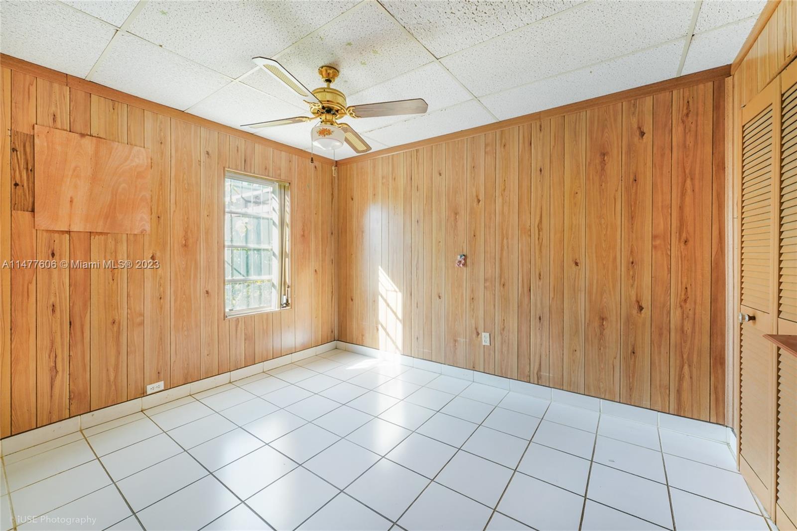1037 Southwest 10th Avenue Miami, FL 33130 - Photo 8 of 19 a view of an empty room and window