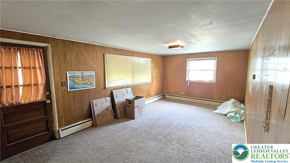 232 Virginia Avenue Whitehall, PA 18052 - Photo 11 of 26 an empty room with windows and closet