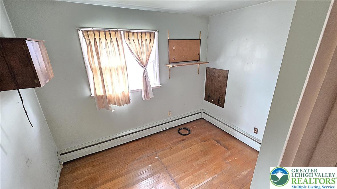 232 Virginia Avenue Whitehall, PA 18052 - Photo 14 of 26 a view of an empty room and window
