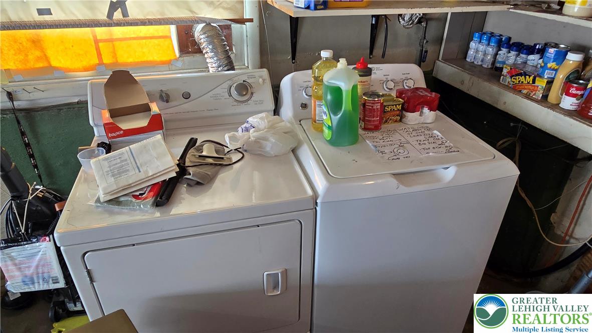 232 Virginia Avenue Whitehall, PA 18052 - Photo 21 of 26 a utility room with dryer and washer