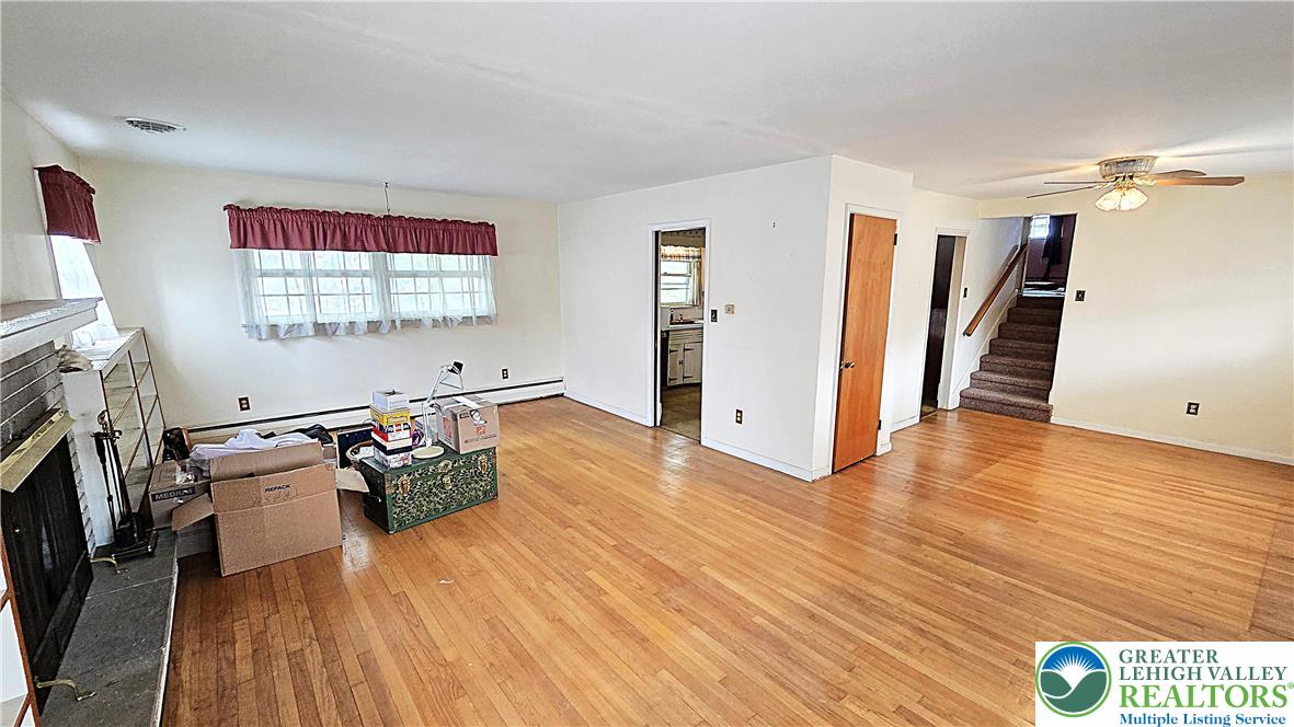 232 Virginia Avenue Whitehall, PA 18052 - Photo 3 of 26 a view of livingroom with furniture and wooden floor