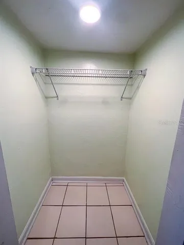 a view of a room with racks on the wall