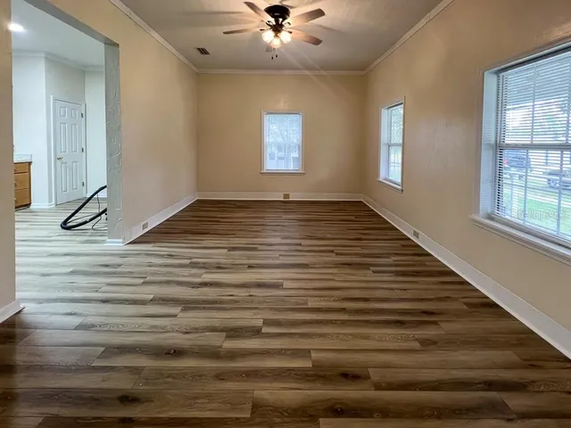 a view of an empty room and window