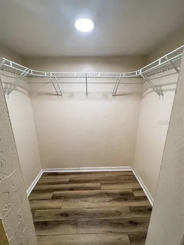 a view of a room with racks on the wall