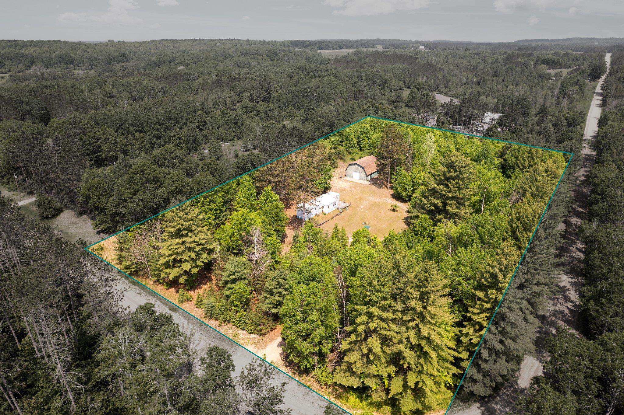 6038 Maple Hill Road Southwest Fife Lake, MI 49633 - Photo 1 of 24