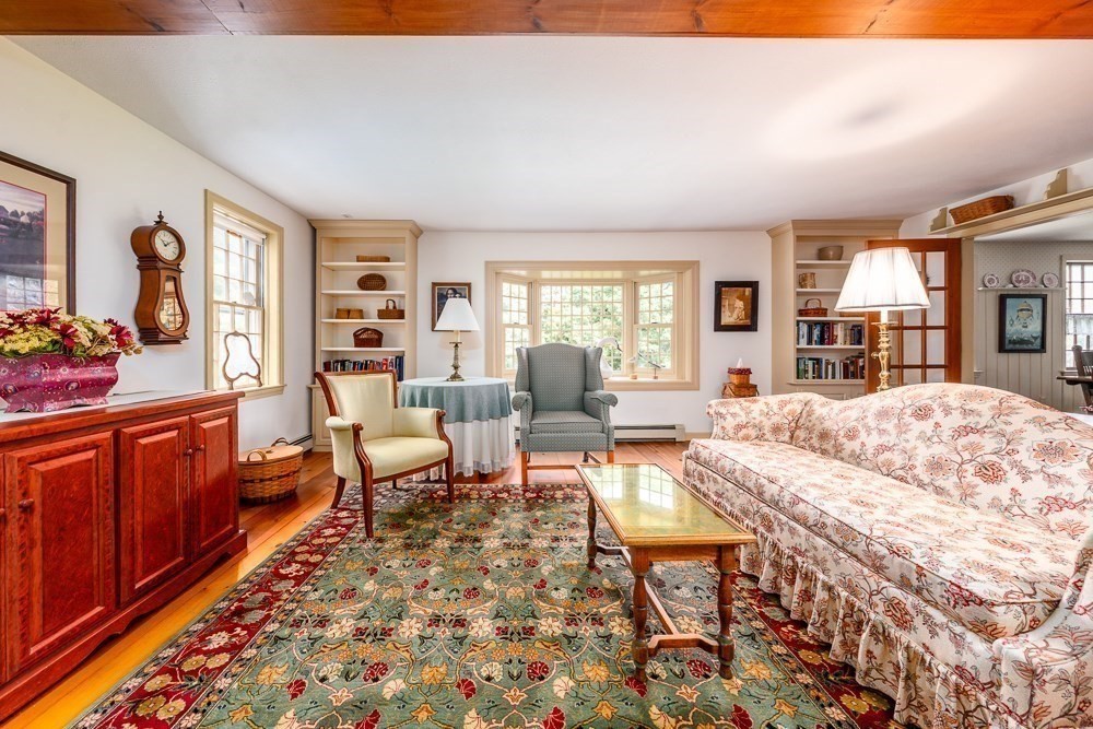 102 Wildwood Road Brewster, MA 02631 - Photo 27 of 41 a living room with furniture and a wooden floor
