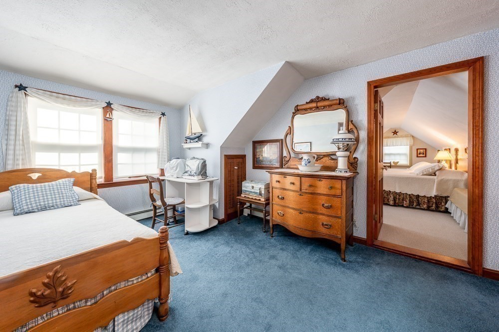 102 Wildwood Road Brewster, MA 02631 - Photo 33 of 41 a room with a bed and a view of bedroom