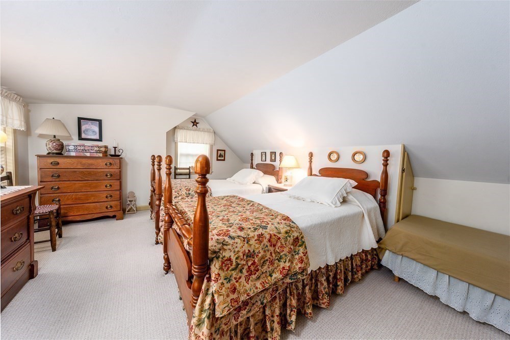102 Wildwood Road Brewster, MA 02631 - Photo 34 of 41 a bedroom with bed and window