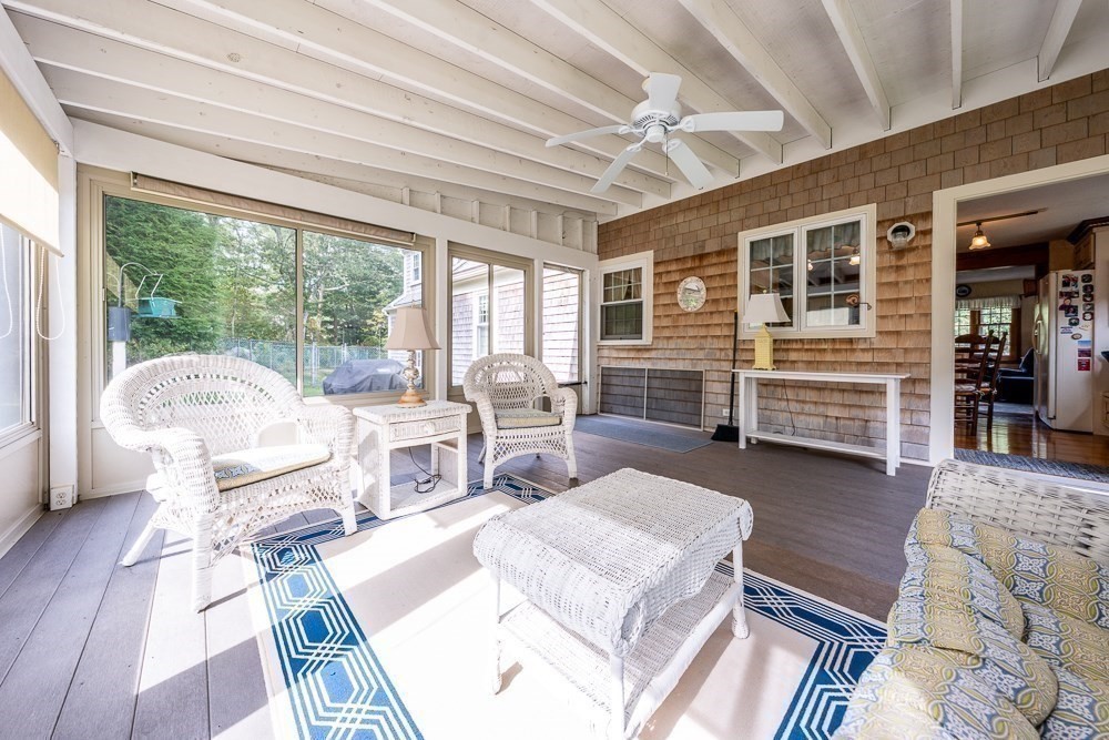102 Wildwood Road Brewster, MA 02631 - Photo 8 of 41 a living room with furniture a wooden floor and next to a window