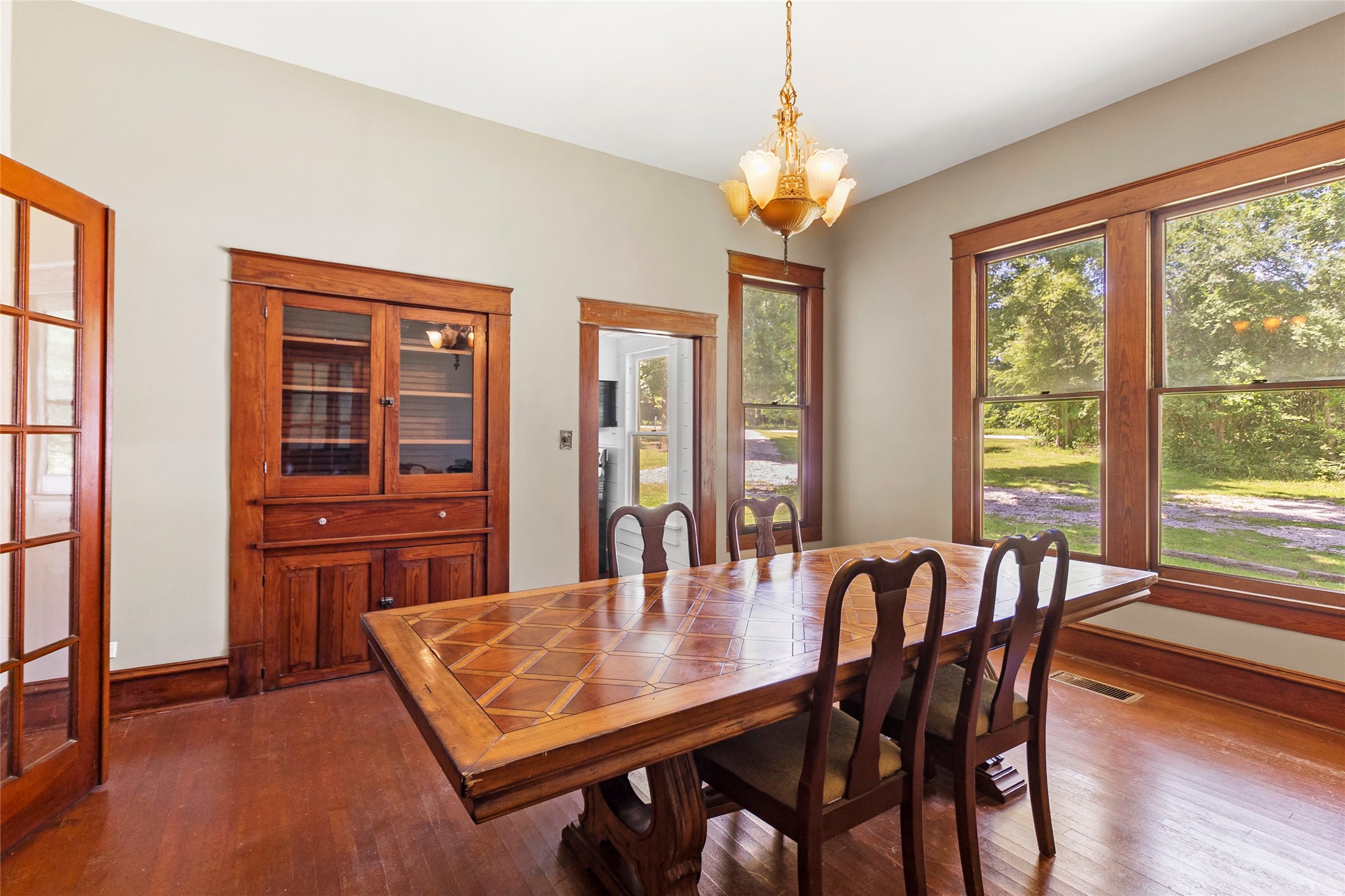 38 Darrell White Road Huntsville, TX 77340 - Photo 13 of 49 a view of a dining room with furniture window and wooden floor