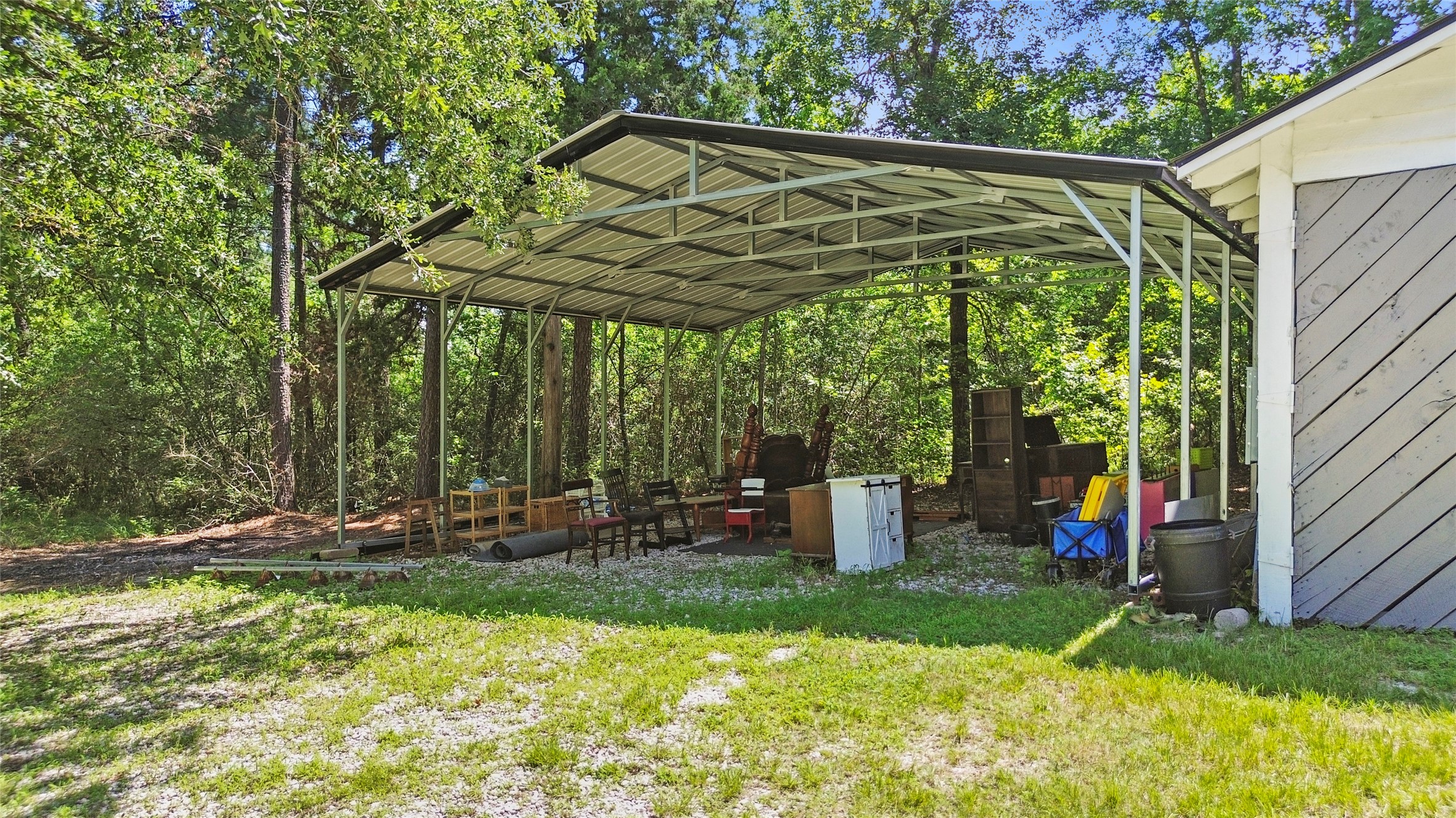 38 Darrell White Road Huntsville, TX 77340 - Photo 35 of 49 a view of outdoor space with seating