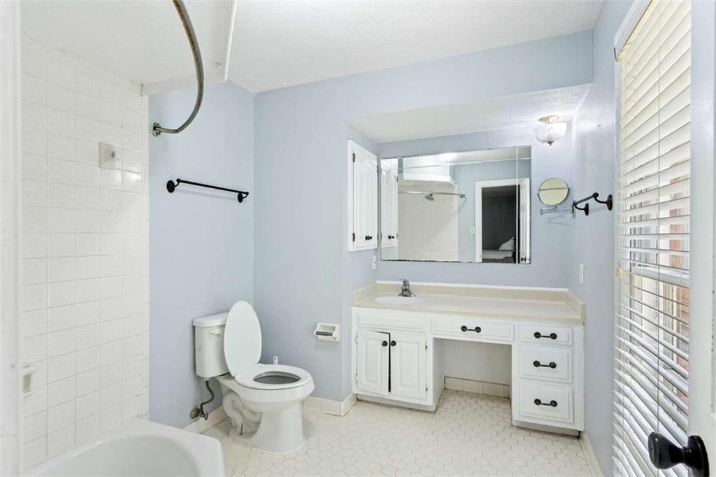 140 Old Fairburn Close Southwest South Fulton, GA 30331 - Photo 14 of 28 a bathroom with a sink toilet and mirror