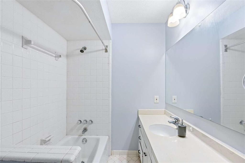 140 Old Fairburn Close Southwest South Fulton, GA 30331 - Photo 16 of 28 a bathroom with a sink a toilet and shower