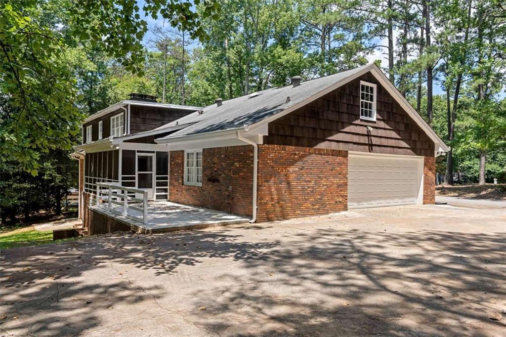 140 Old Fairburn Close Southwest South Fulton, GA 30331 - Photo 25 of 28 a front view of a house with a yard