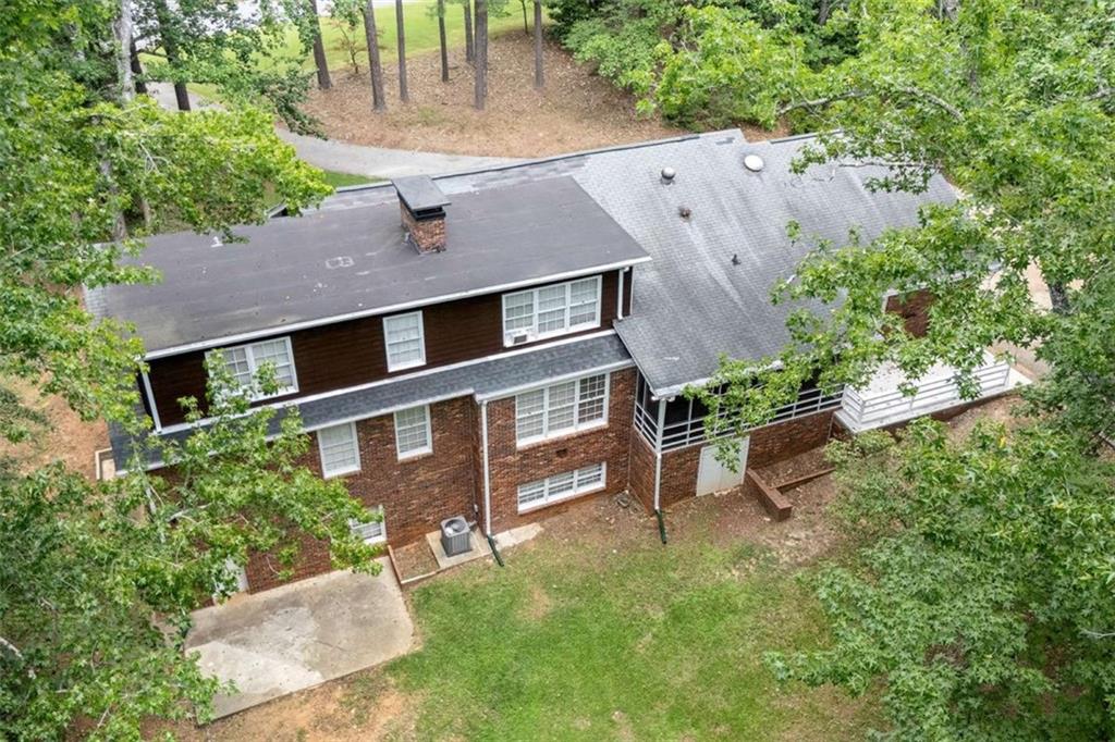 140 Old Fairburn Close Southwest South Fulton, GA 30331 - Photo 26 of 28 an aerial view of a house with a yard