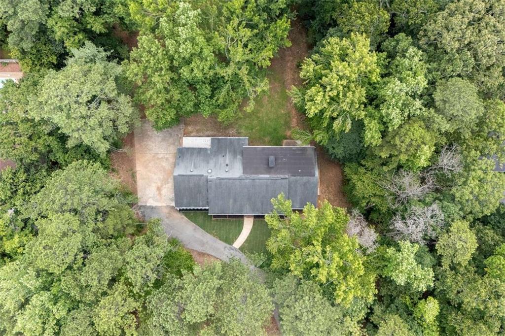 140 Old Fairburn Close Southwest South Fulton, GA 30331 - Photo 28 of 28 an aerial view of a house with a yard and a large tree