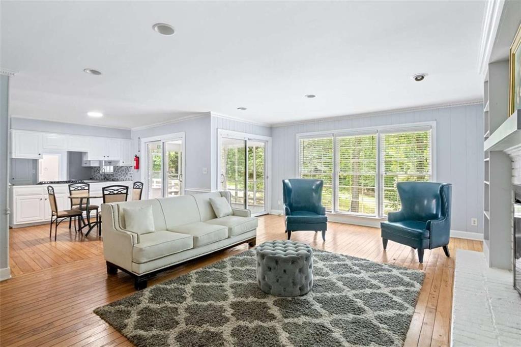 140 Old Fairburn Close Southwest South Fulton, GA 30331 - Photo 8 of 28 a living room with furniture and a large window