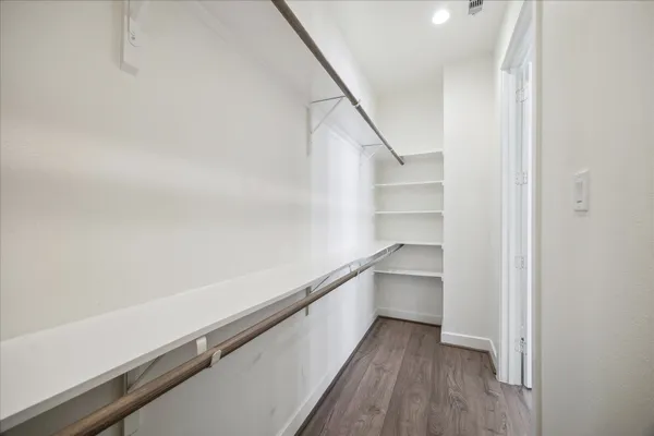 a hallway with a wooden floor