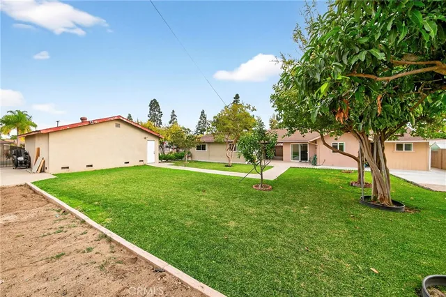 a house view with a garden space