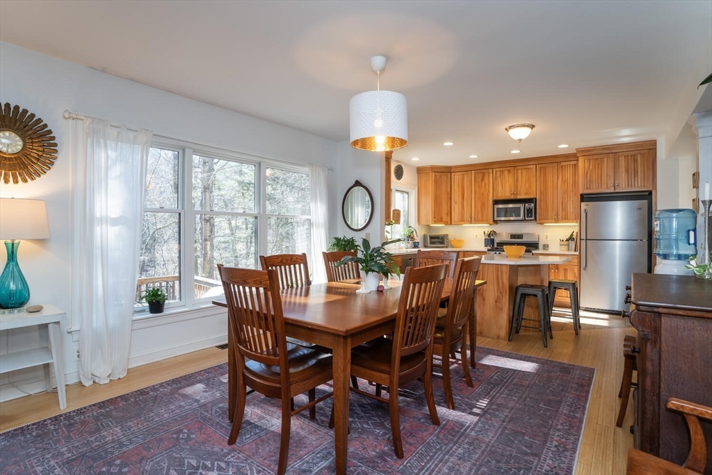 642 North Farms Road Northampton, MA 01062 - Photo 13 of 42 a view of a dining room with furniture window and wooden floor