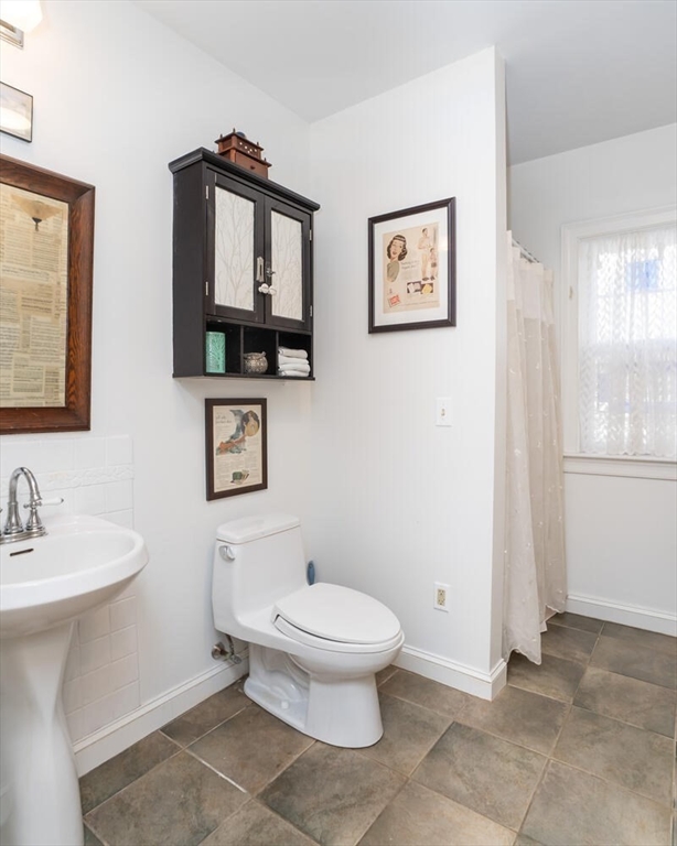642 North Farms Road Northampton, MA 01062 - Photo 19 of 42 a bathroom with a toilet a sink and mirror
