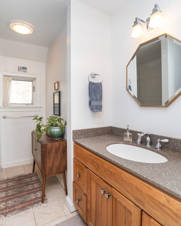 642 North Farms Road Northampton, MA 01062 - Photo 24 of 42 a bathroom with a granite countertop sink and a mirror
