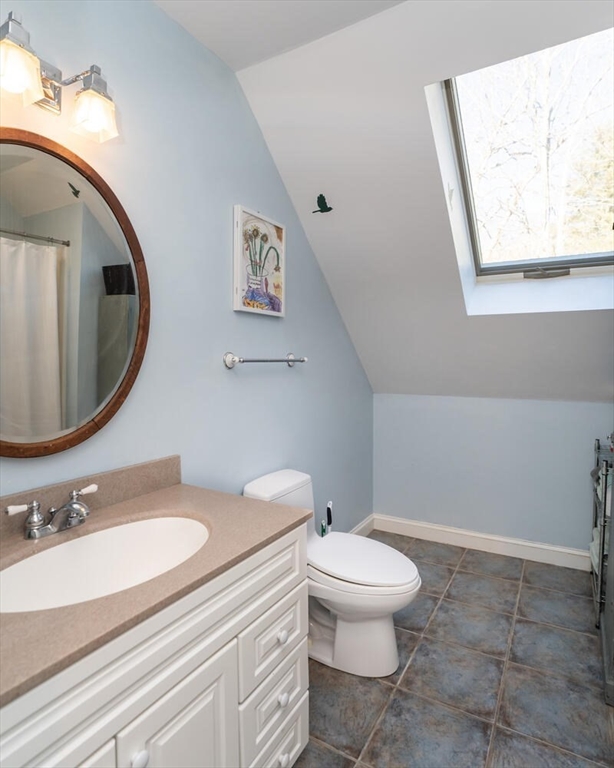 642 North Farms Road Northampton, MA 01062 - Photo 26 of 42 a bathroom with a sink a toilet and mirror