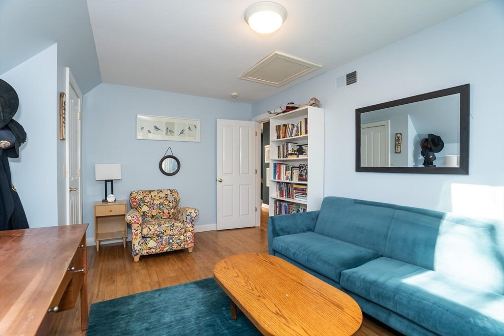 642 North Farms Road Northampton, MA 01062 - Photo 27 of 42 a living room with furniture and a flat screen tv