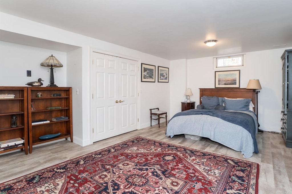 642 North Farms Road Northampton, MA 01062 - Photo 30 of 42 a bedroom with a bed and a dresser