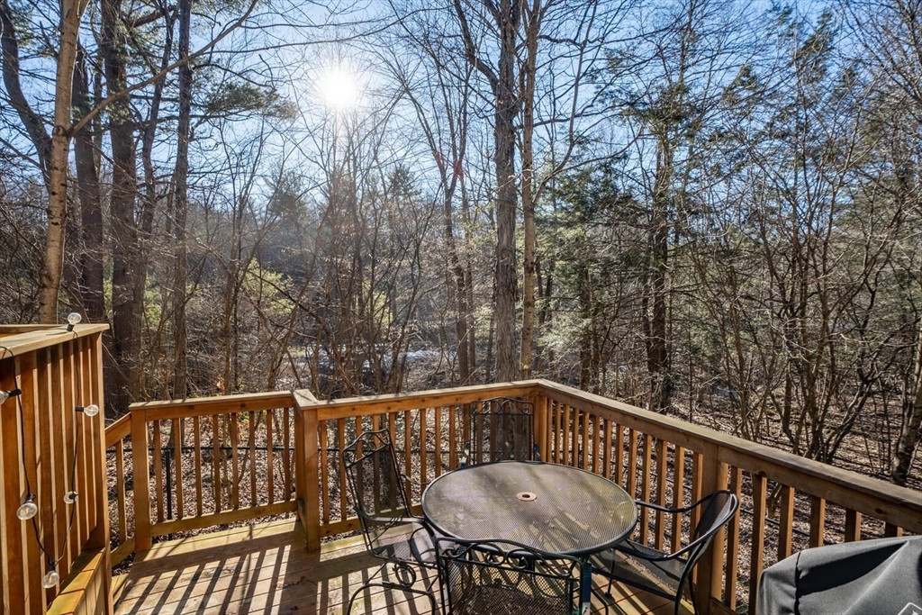 642 North Farms Road Northampton, MA 01062 - Photo 39 of 42 a view of balcony with a hardwood and trees