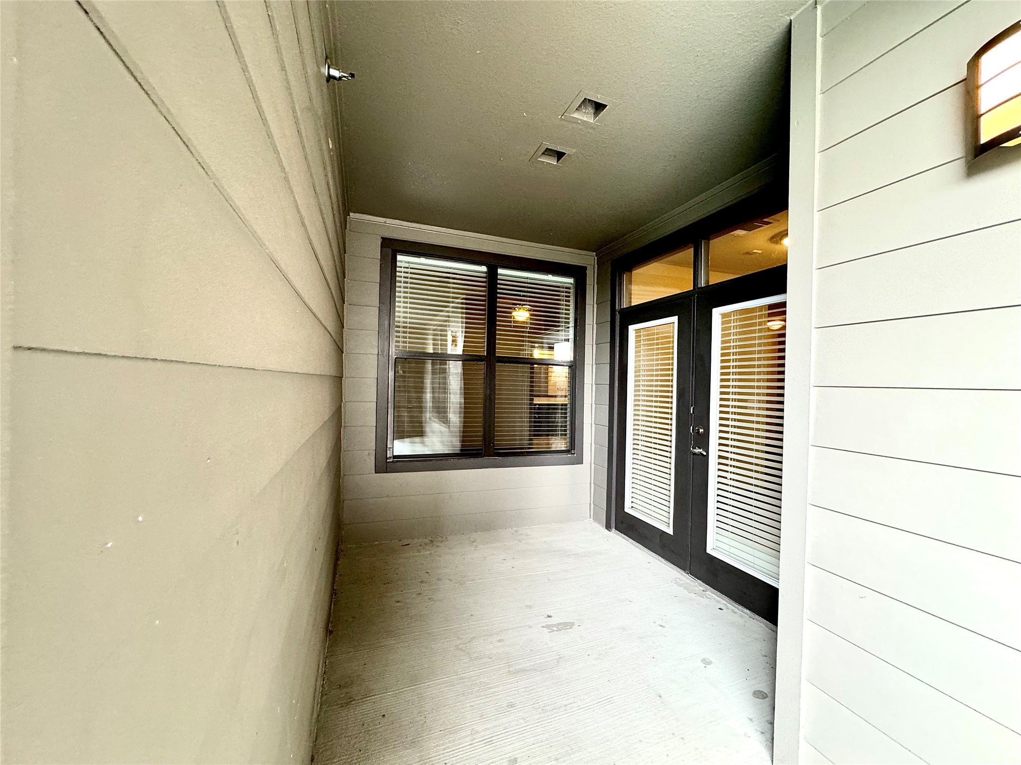 2033 South Gessner Road, Unit 2105 Houston, TX 77063 - Photo 14 of 23 a view of an empty room with a window