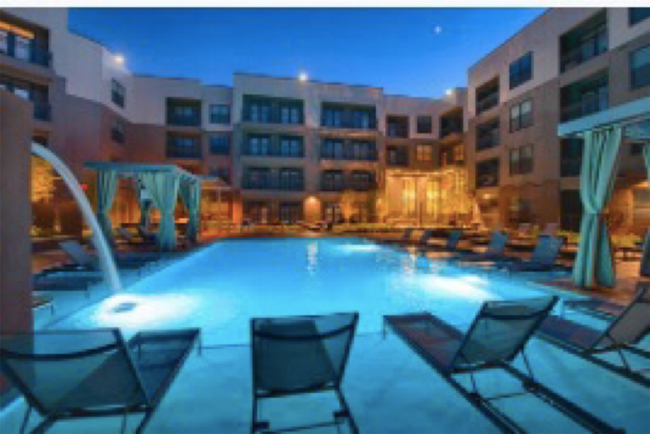 2033 South Gessner Road, Unit 2105 Houston, TX 77063 - Photo 20 of 23 a view of a livingroom with furniture and a book shelf