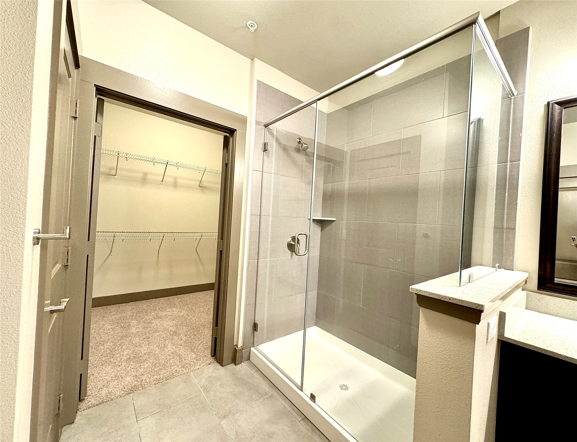2033 South Gessner Road, Unit 2105 Houston, TX 77063 - Photo 6 of 23 a bathroom with a shower and a sink