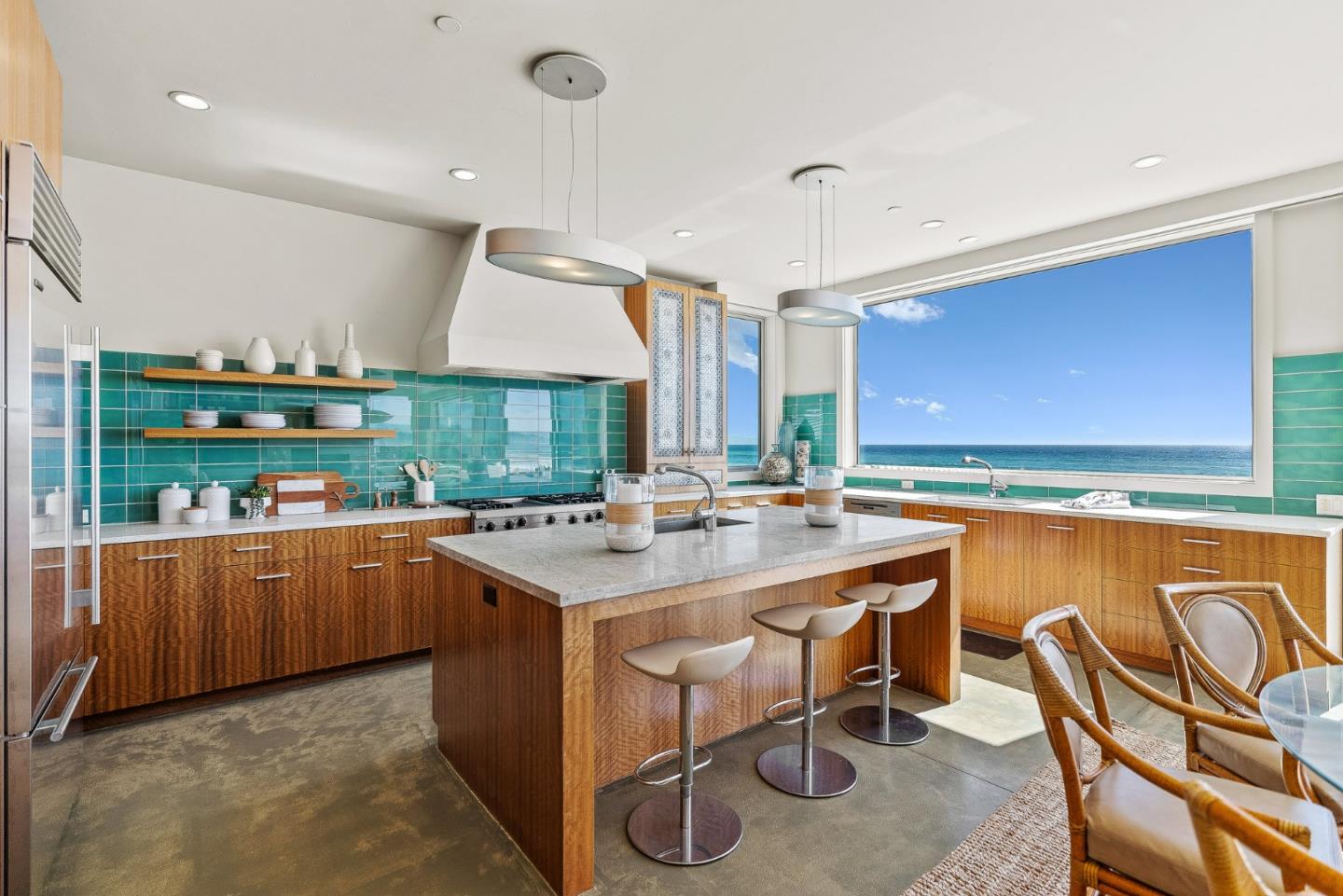 618 Beach Drive Aptos, CA 95003 - Photo 18 of 99 a kitchen with stainless steel appliances granite countertop a stove and a refrigerator