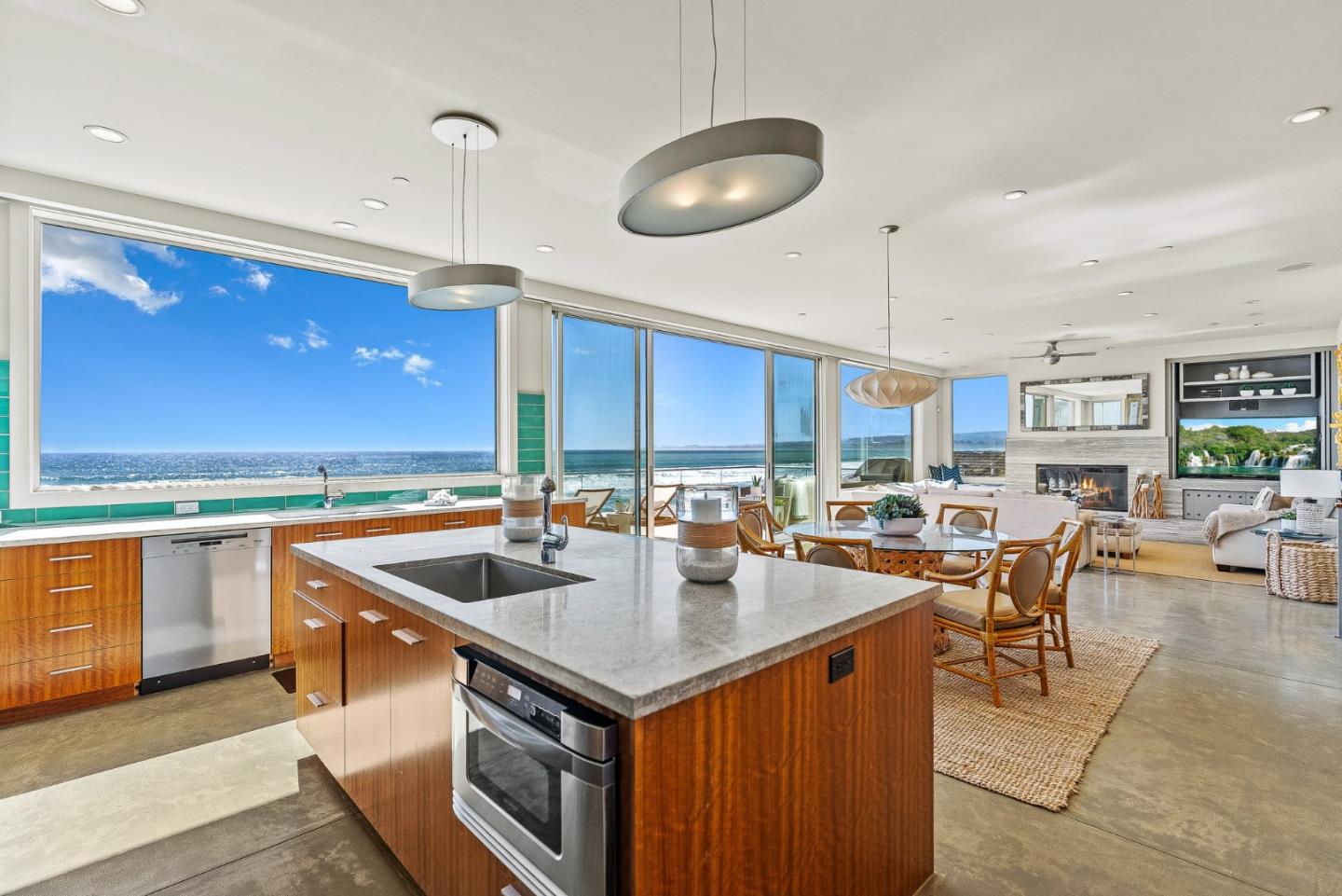 618 Beach Drive Aptos, CA 95003 - Photo 25 of 99 a kitchen with stainless steel appliances granite countertop a sink a counter space and living room view