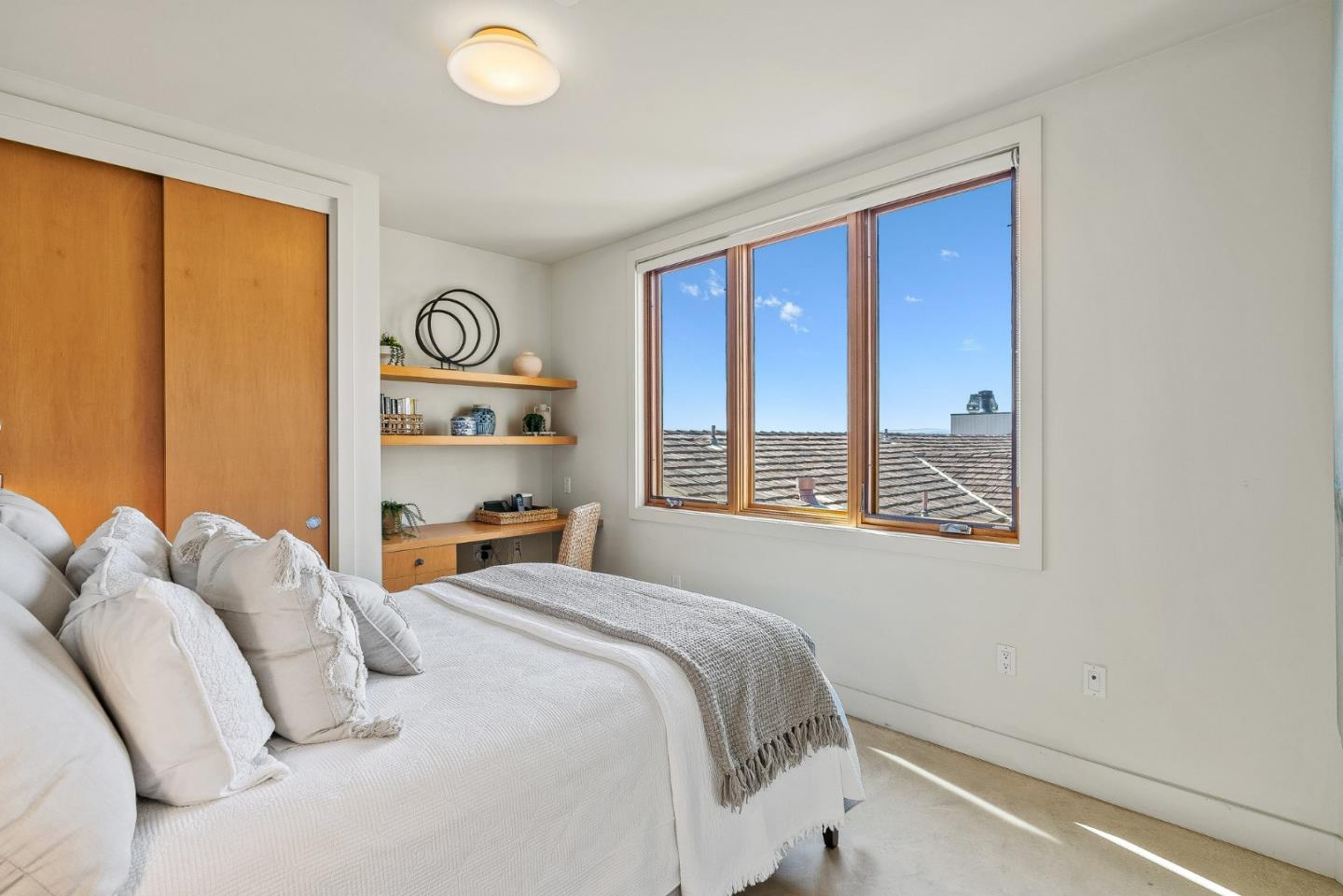 618 Beach Drive Aptos, CA 95003 - Photo 45 of 99 a bedroom with a bed and a window