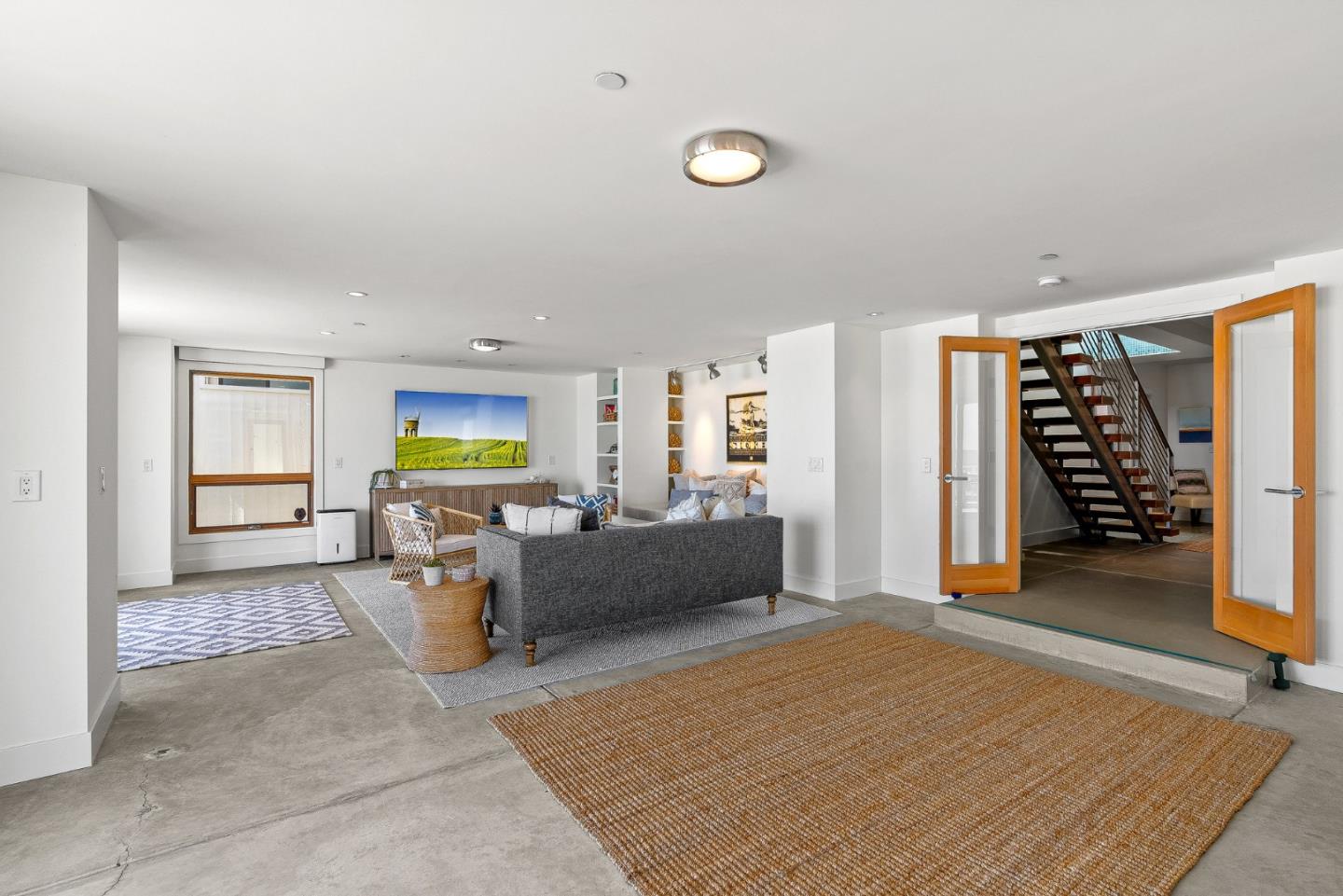618 Beach Drive Aptos, CA 95003 - Photo 61 of 99 a living room with furniture a rug and a window