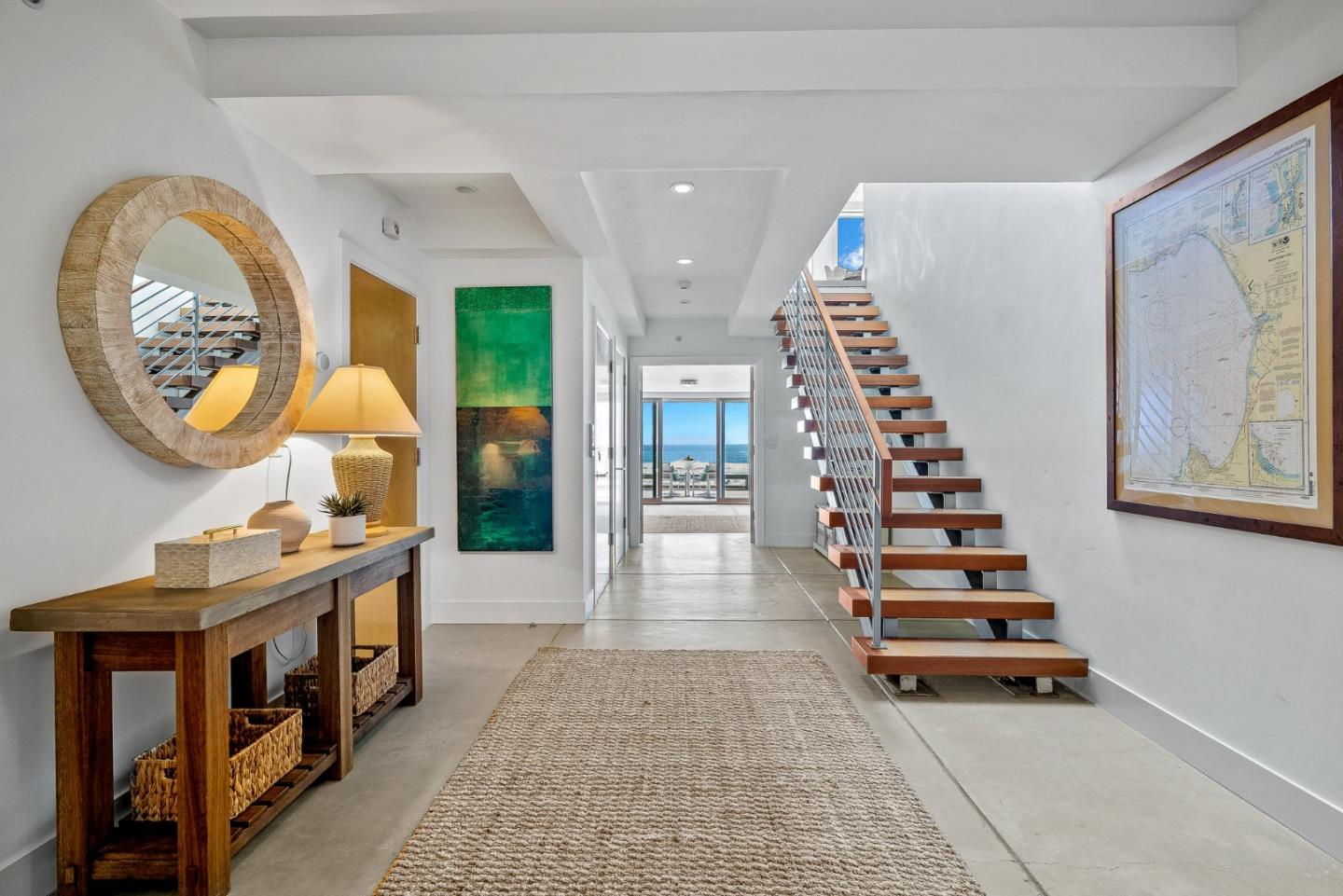 618 Beach Drive Aptos, CA 95003 - Photo 7 of 99 a room with lots of white furniture and a wooden floor