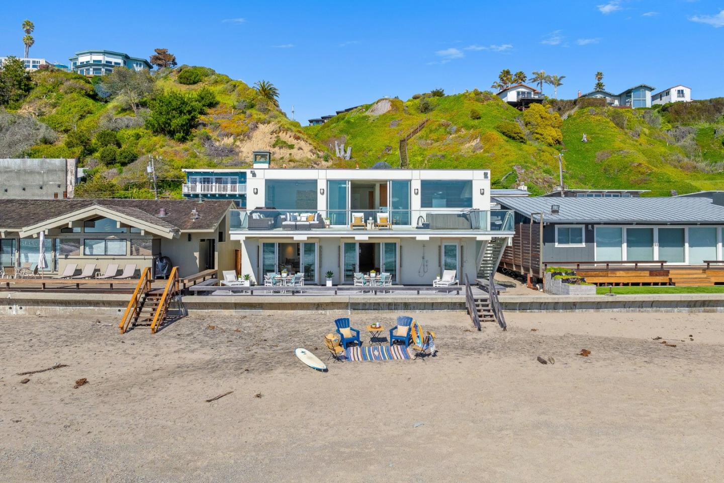 618 Beach Drive Aptos, CA 95003 - Photo 78 of 99 a front view of a house with swimming pool and sitting area