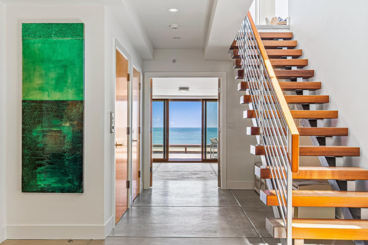 618 Beach Drive Aptos, CA 95003 - Photo 8 of 99 a view of a hallway with entryway and hall with wooden floor