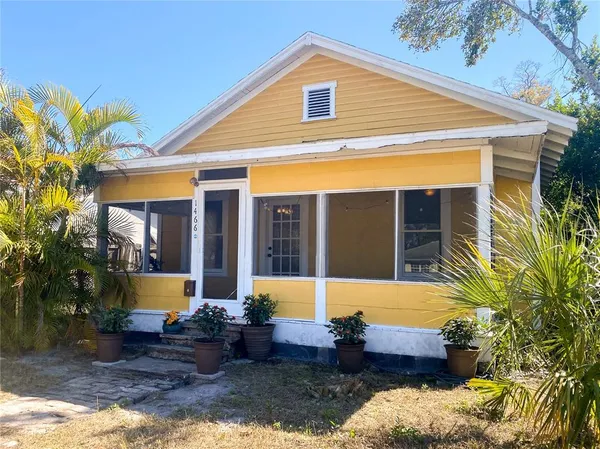 a front view of house with swimming pool and porch
