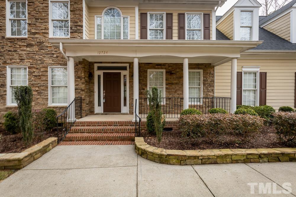 12724 Amoretto Way Raleigh, NC 27613 - Photo 2 of 44 a view of a house with potted plants